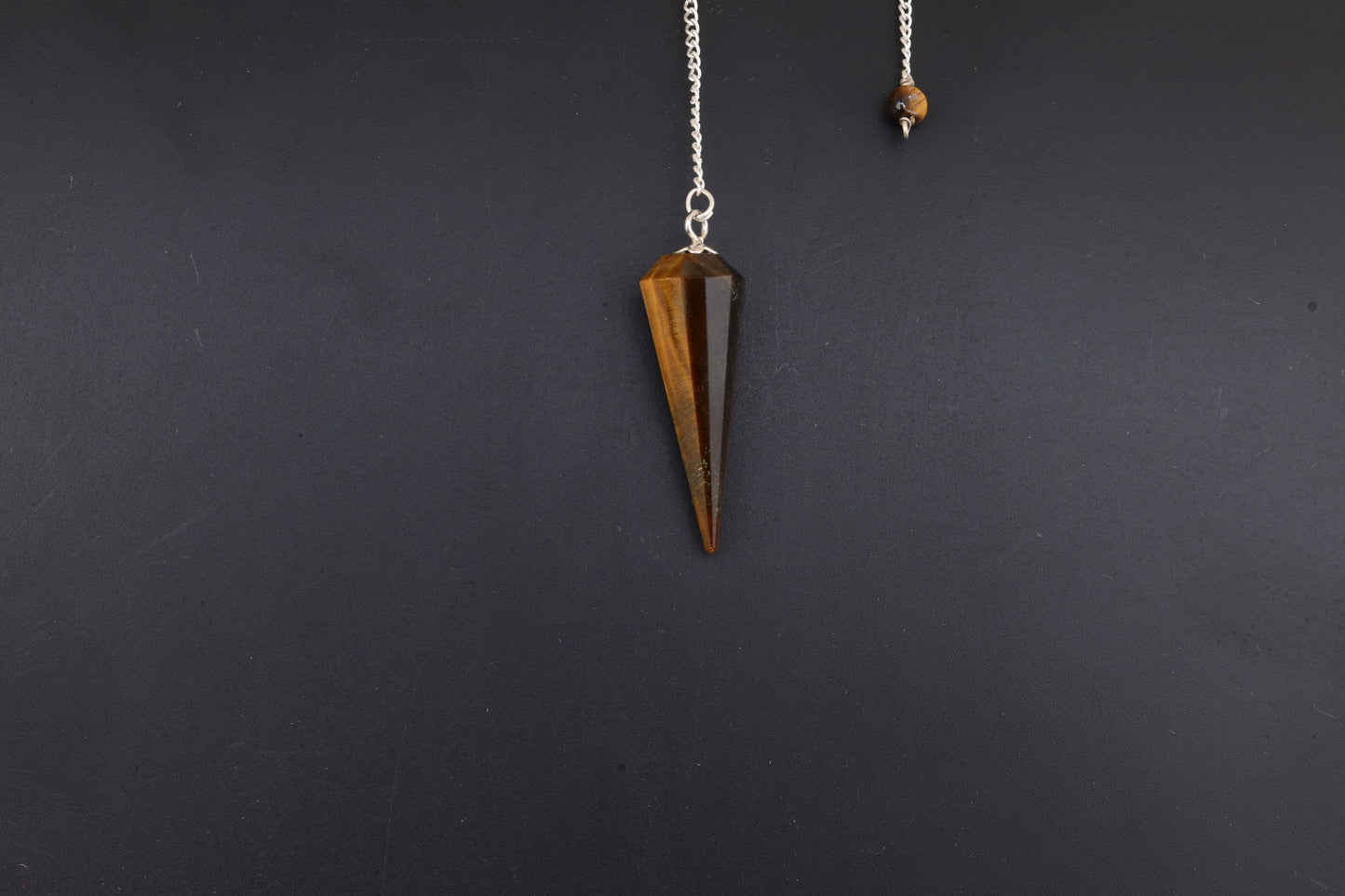 Tiger Eye Faceted Pendulums